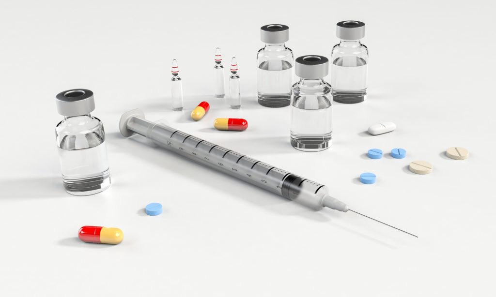 Diabetes syringe, medications and glucose