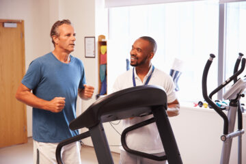 Man on Treadmill with Doctor Watching