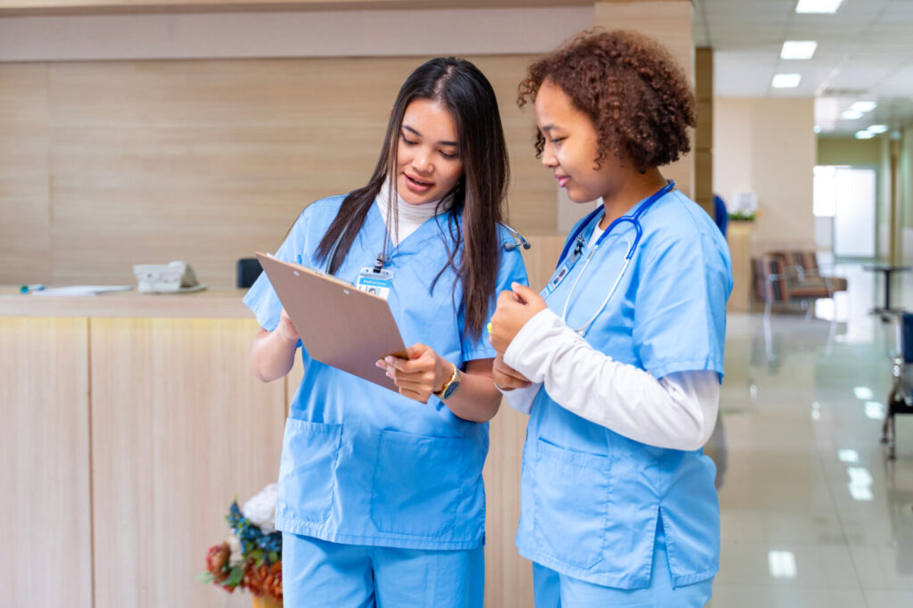 Medical professionals reviewing a chart for a patient who has COPD and Peripheral Artery Disease